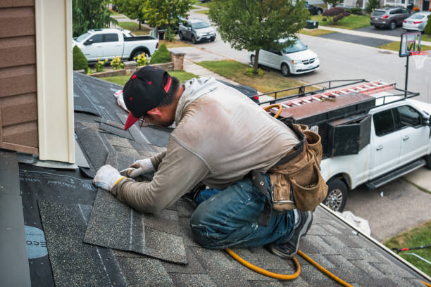 Professional Gutter Repair And Installation technician working in Mallory, NY